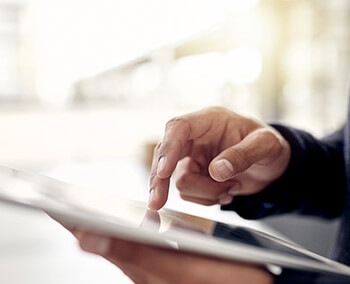 A man using his tablet