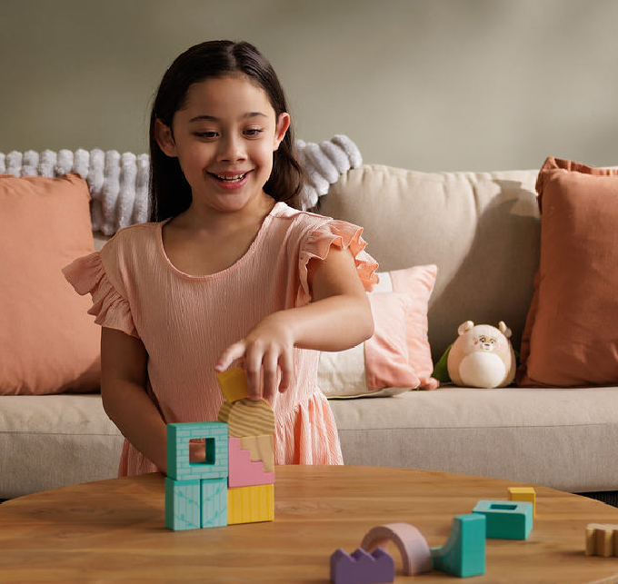 young girl with blocks